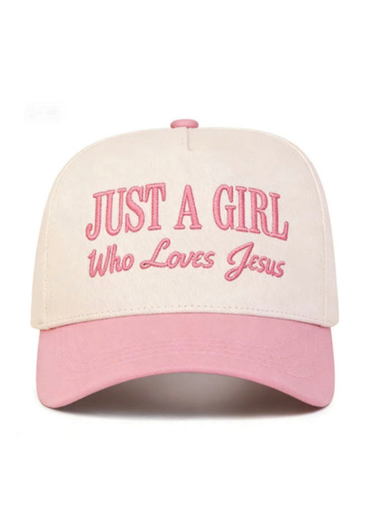 Black hat with "Just A Girl" embroidered design from Ivy's Gifts & Boutique, stylish accessory for casual wear.