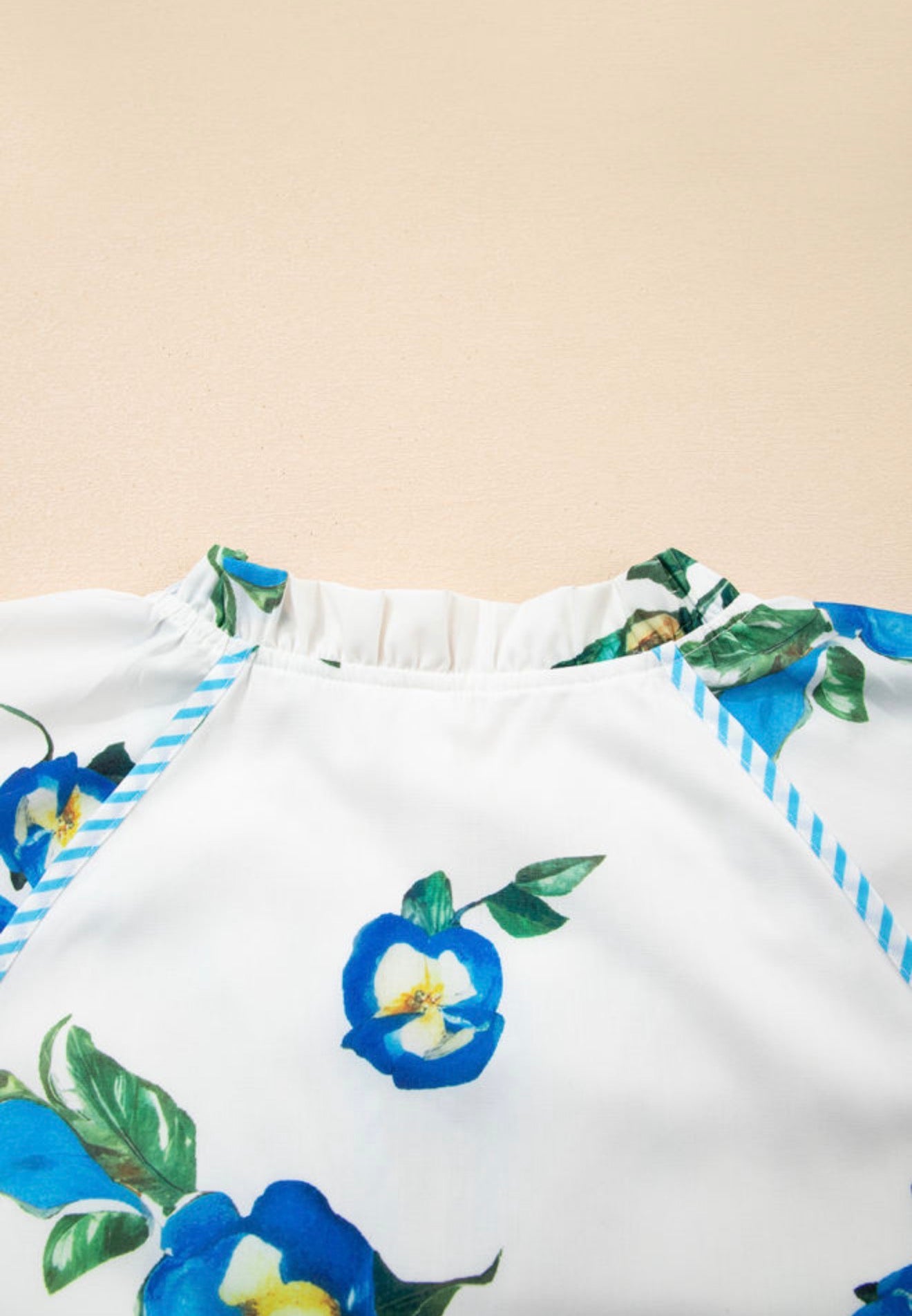 PP34 White Dress with Blue Floral Print and Contrast Tie V Neck and Puff Sleeves