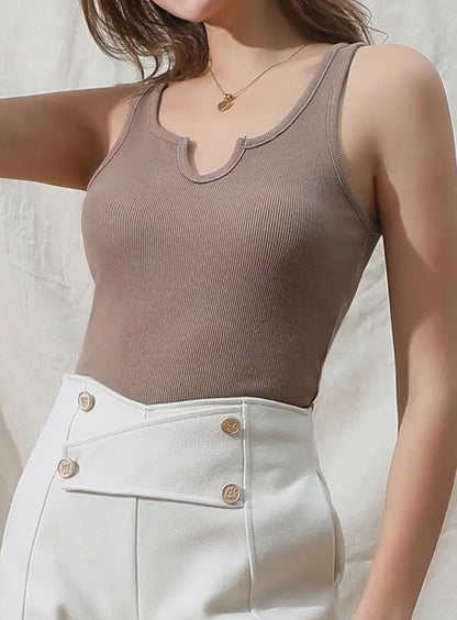 Ribbed knit cami tank with notched neckline in neutral color, featuring sleeveless design and fitted silhouette from Ivy's Gifts & Boutique.