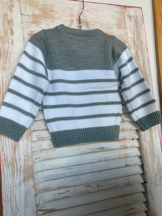 Gray and white striped sweater with Power T embellishment by Ivy's Gifts & Boutique, showcasing knit fabric and stylish design.