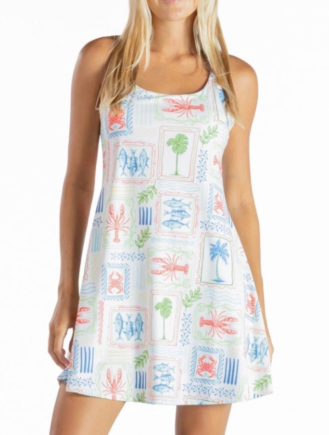 Colorful sea prints romper dress with patch design, built-in bra, SPF 50 protection, perfect for summer, by Ivy's Gifts & Boutique.