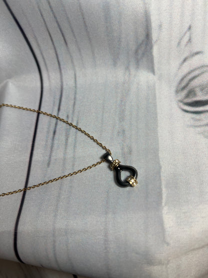 Matte black and gold with diamonds necklace