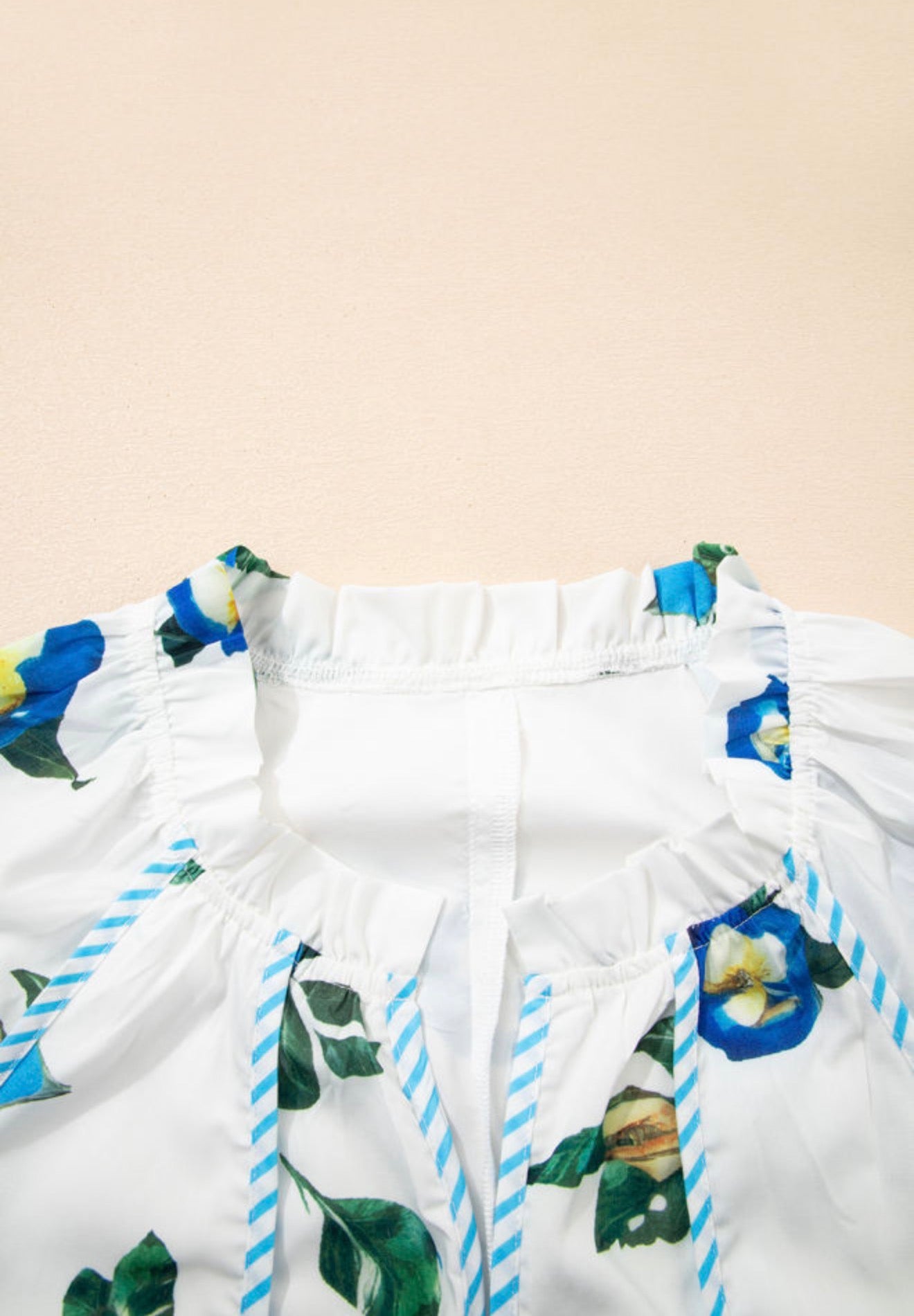 PP34 White Dress with Blue Floral Print and Contrast Tie V Neck and Puff Sleeves
