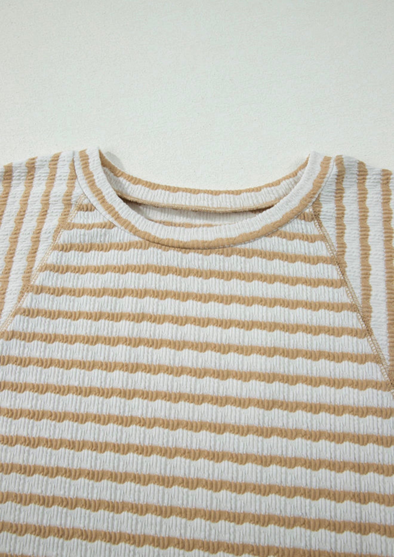 Light khaki striped short sleeve top from Ivy's Gifts & Boutique's PP20 Casual Basic collection, soft and versatile for all wardrobes.