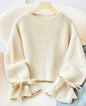 Ivory long puff sleeve sweater with accent bows at the wrists, stylish knit top from Ivy's Gifts & Boutique.