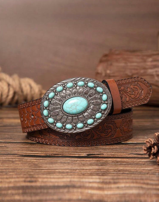 Faux turquoise western style belt by Ivy's Gifts & Boutique featuring a detailed buckle and turquoise accents.
