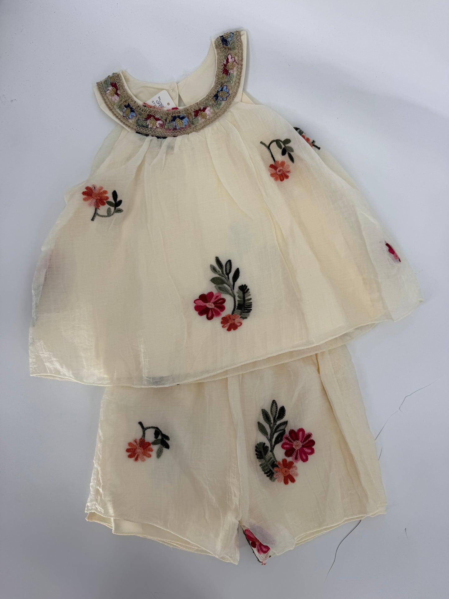 Ivy's Gifts & Boutique embroidered floral short set with gauze overlay, featuring an embellished collar and matching shorts.