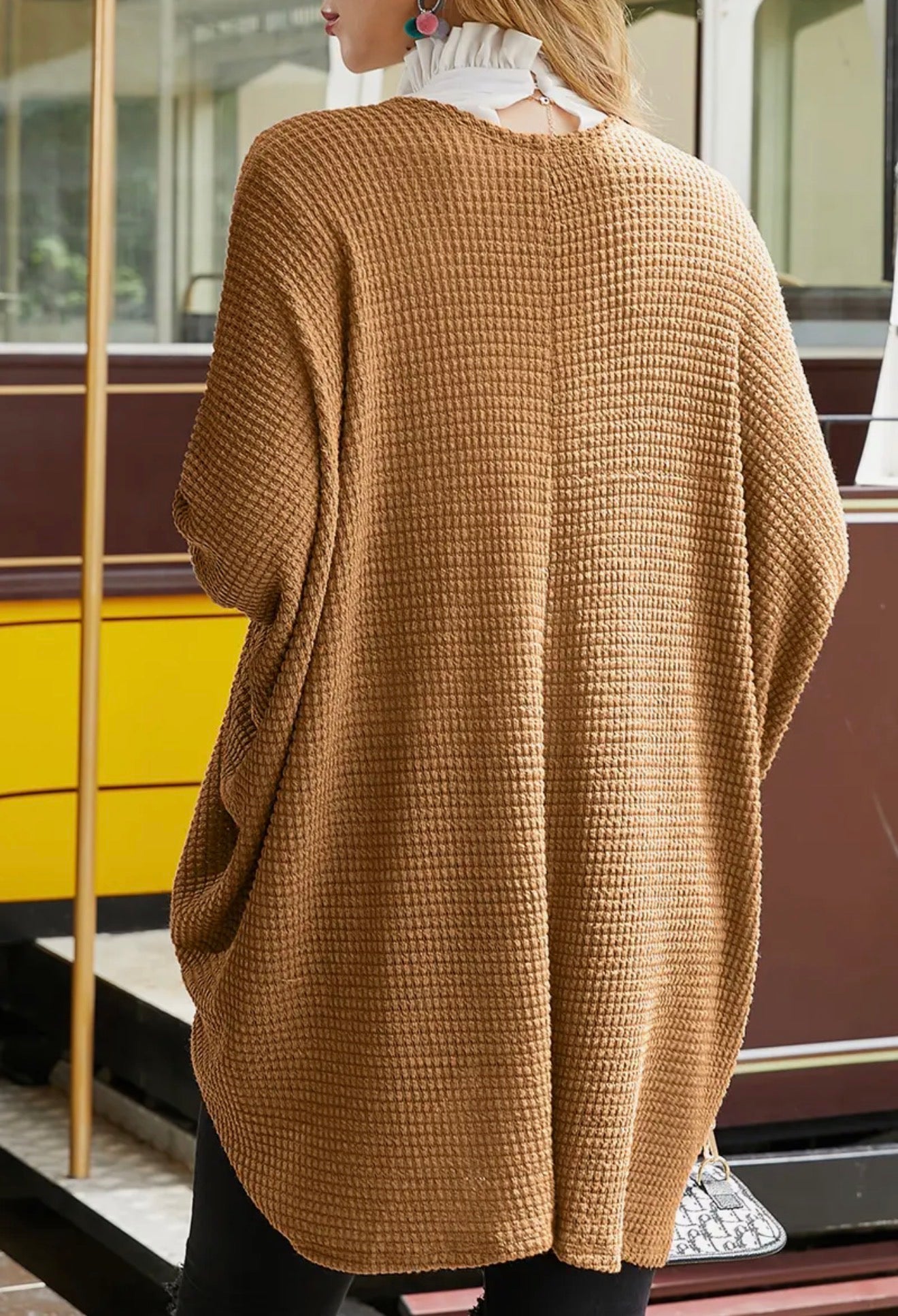 Textured fabric open front cardigan with dolman sleeves by Ivy's Gifts & Boutique, displayed on a neutral background.