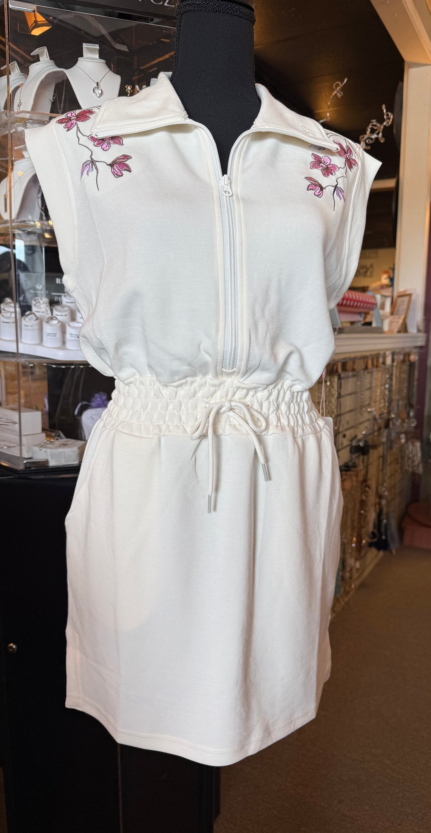 Ivy's Gifts & Boutique SS 49967 cap sleeve mini dress with zip front, drawstring waist, and side pockets, casual and stylish.