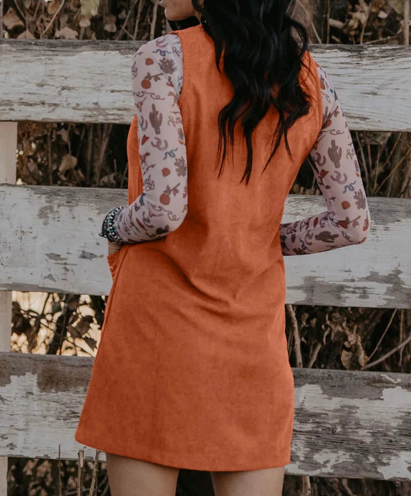 Sleeveless Rust colored dress with Accent Stitched Pocket Design