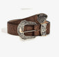 Western style embossed leather belt with silver buckle accents from Ivy's Gifts & Boutique, featuring detailed embossed patterns and a silver buckle.