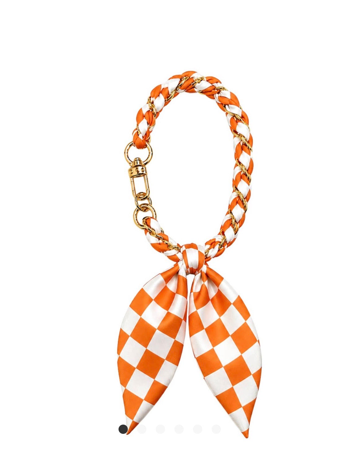 Orange and white TN58 scarf style phone wristlet by Ivy's Gifts & Boutique with fabric strap and decorative pattern.