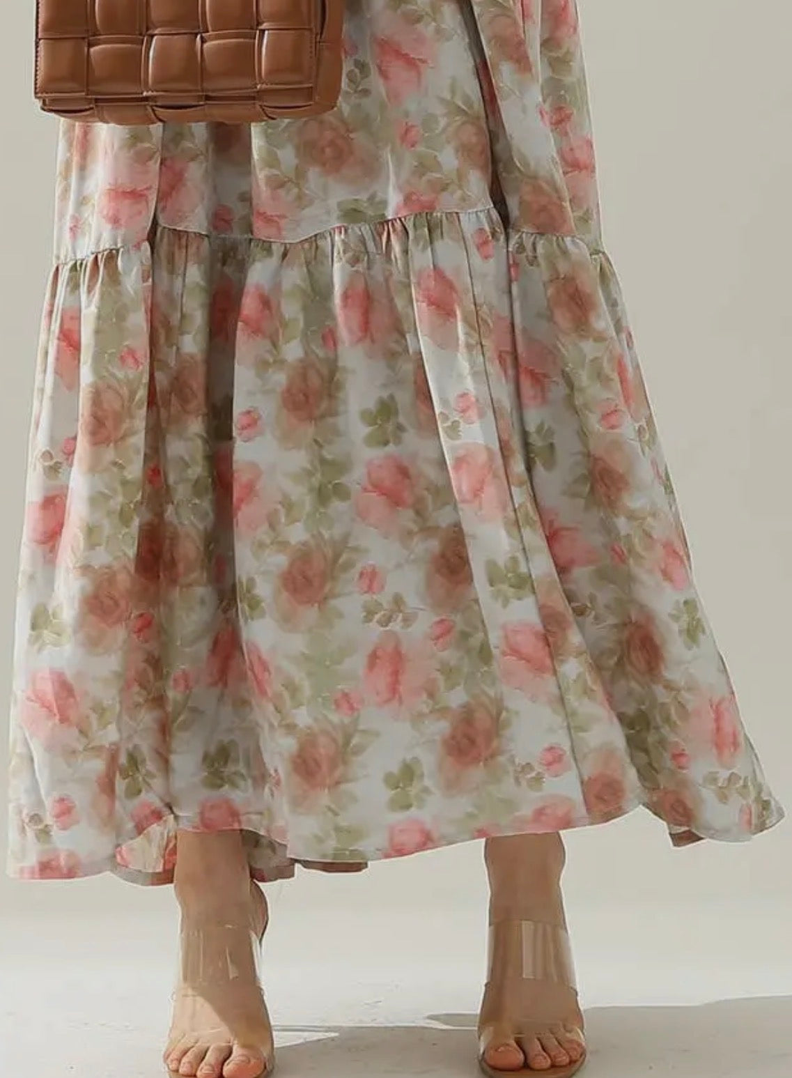Floral maxi dress with shoulder strap tie detail by Ivy's Gifts & Boutique, featuring a flowing fabric and vibrant print.