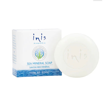 Inis bath and body products display with bottles of lotion, body wash, and skincare items on a clean, elegant background