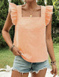 Orange and white checked square neckline top with butterfly cap sleeves from Ivy's Gifts & Boutique.