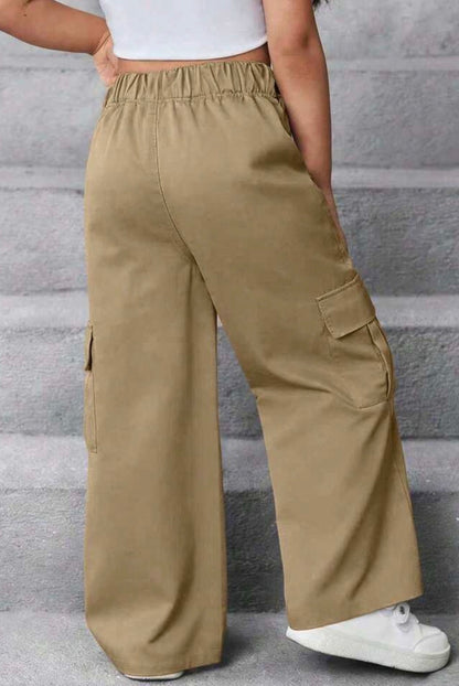 Khaki elastic waist pants with cargo and front pockets from Ivy's Gifts & Boutique, shown in a casual style.