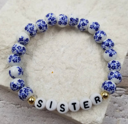 Colorful SSB Sister ceramic beaded stretch bracelet by Ivy's Gifts & Boutique with vibrant beads and a comfortable stretch fit.