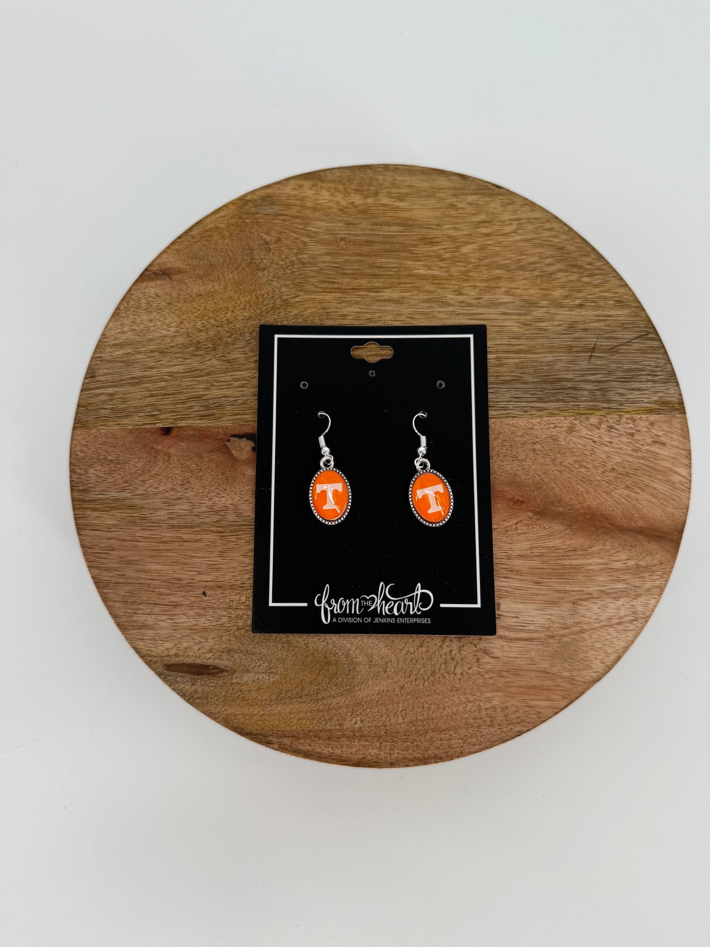 Oval Power T earrings set in silver from the heart