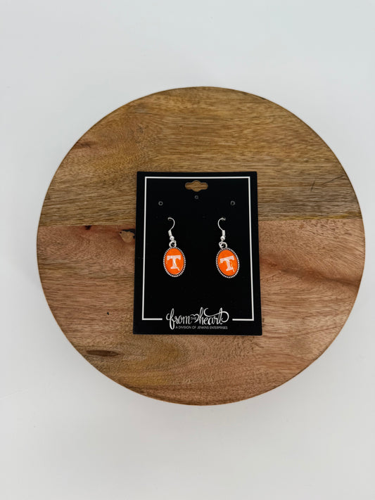 Oval Power T earrings set in silver from the heart