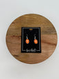 Oval Power T earrings set in silver from the heart