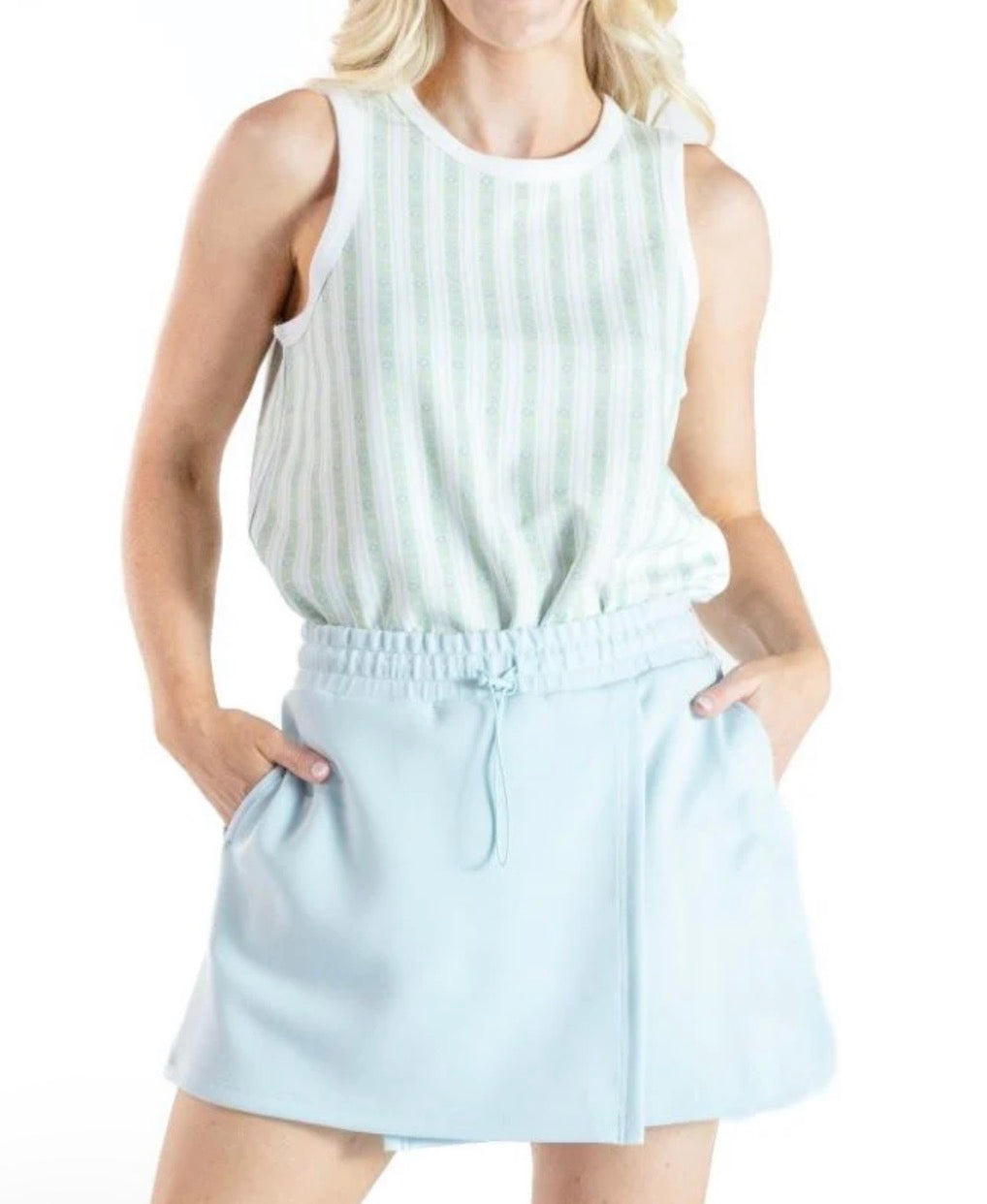 Light blue skort with pockets and drawstring, stylish and comfortable from Ivy's Gifts & Boutique, shown on a model.