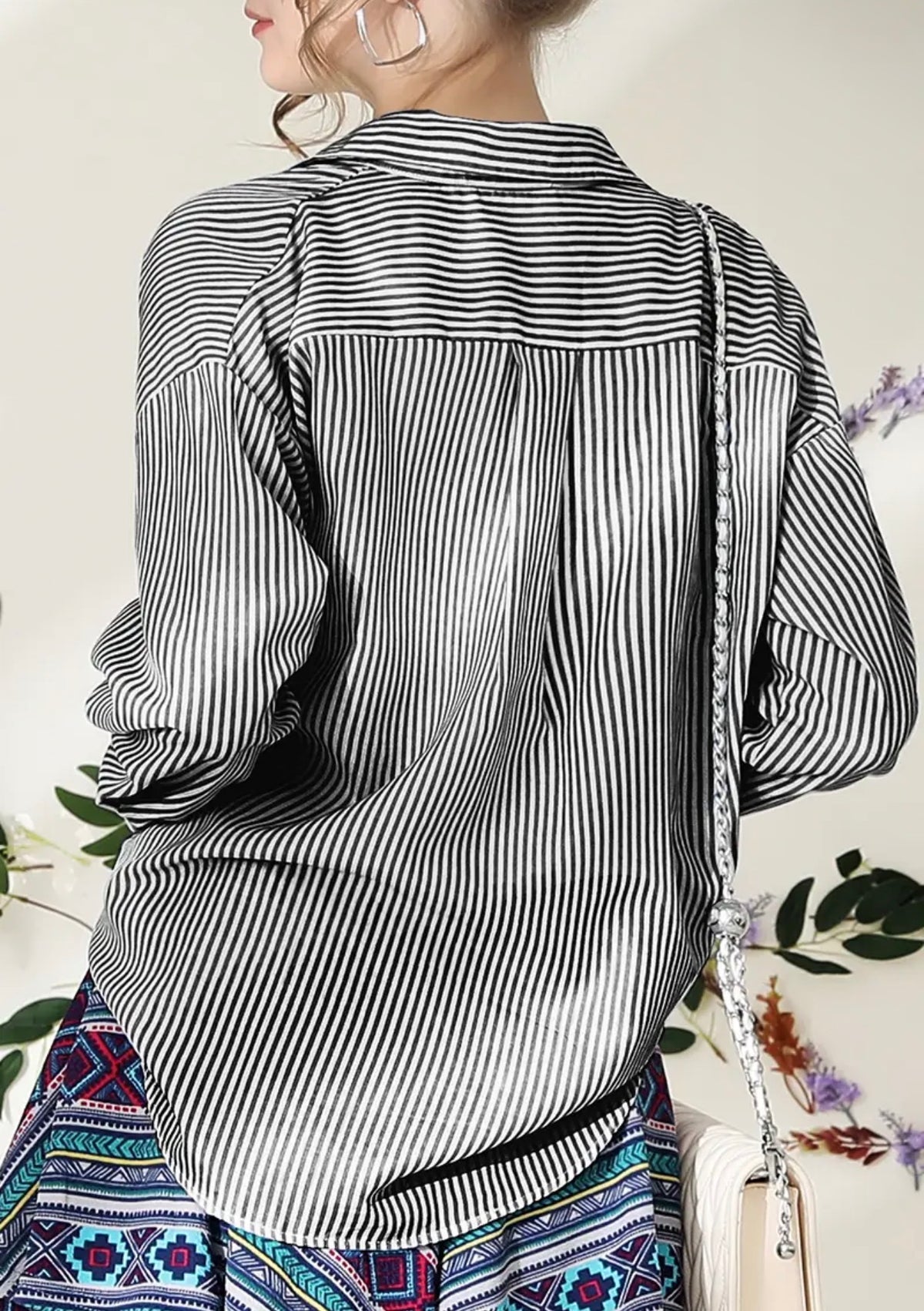 Black stripe button-down blouse by Ivy's Gifts & Boutique, styled with long sleeves and a classic collar for versatile fashion.