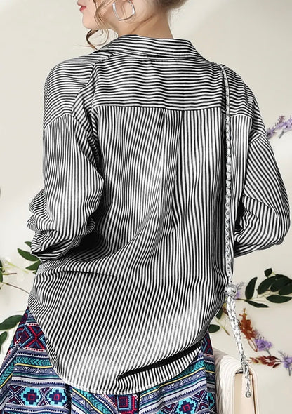 Black stripe button-down blouse by Ivy's Gifts & Boutique, styled with long sleeves and a classic collar for versatile fashion.