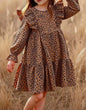 Animal print long sleeve dress with ruffle details on shoulders and hem, by Ivy's Gifts & Boutique