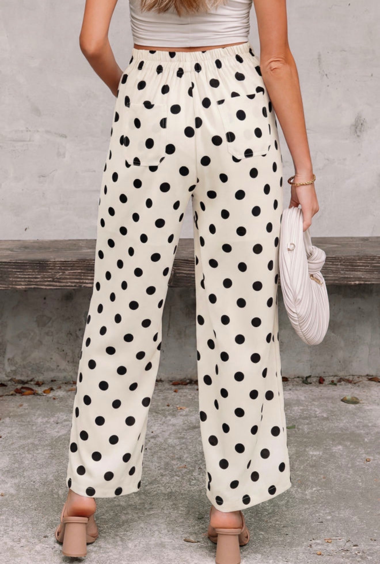 Black polka dot cream pants with back and side pockets from Ivy's Gifts & Boutique, casual and stylish women's trousers.