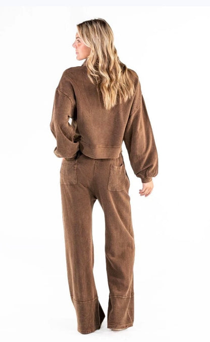 Brown washed panel pants and cropped snap sweatshirt top from Ivy's Gifts & Boutique, casual wear with distressed details.