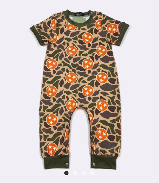 Camouflage print tri-star one-piece romper by Ivy's Gifts & Boutique shown on a model, featuring a stylish camo design.