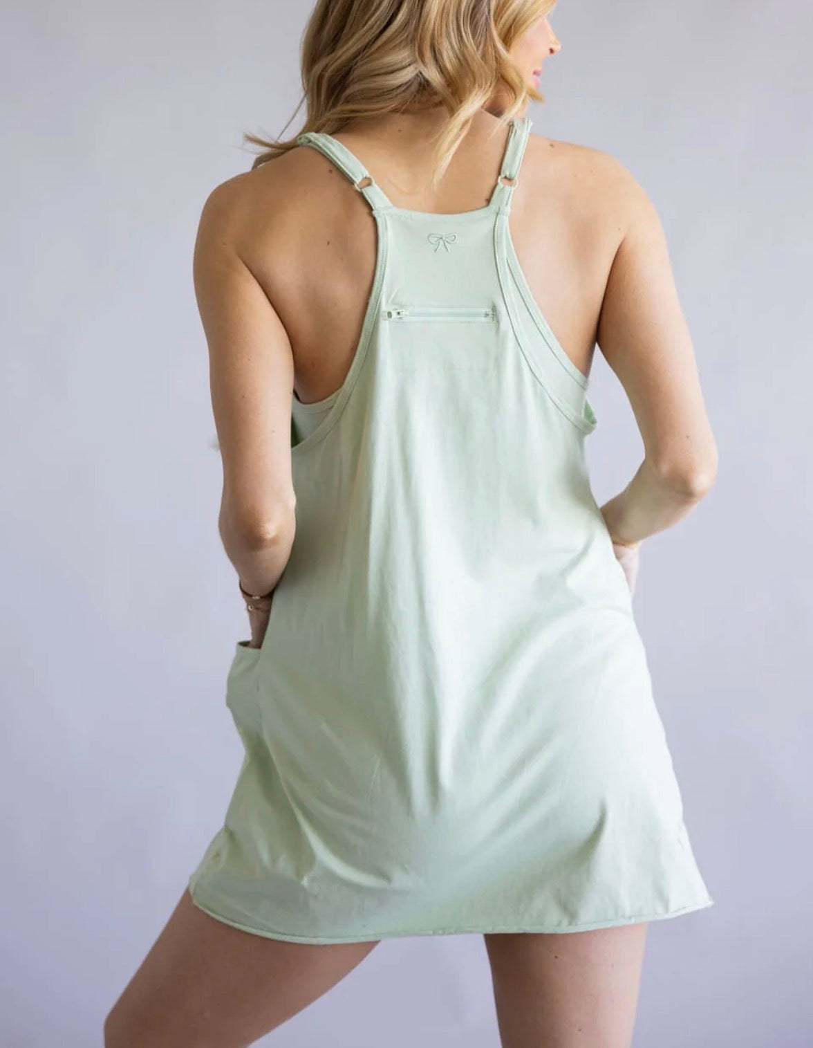 Light green Simply Southern romper with short sleeves and floral pattern, perfect for casual summer wear.