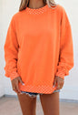 MLOPD Orange Long Sleeve Top with Polka Dot Accented Hem and Sleeve Trim