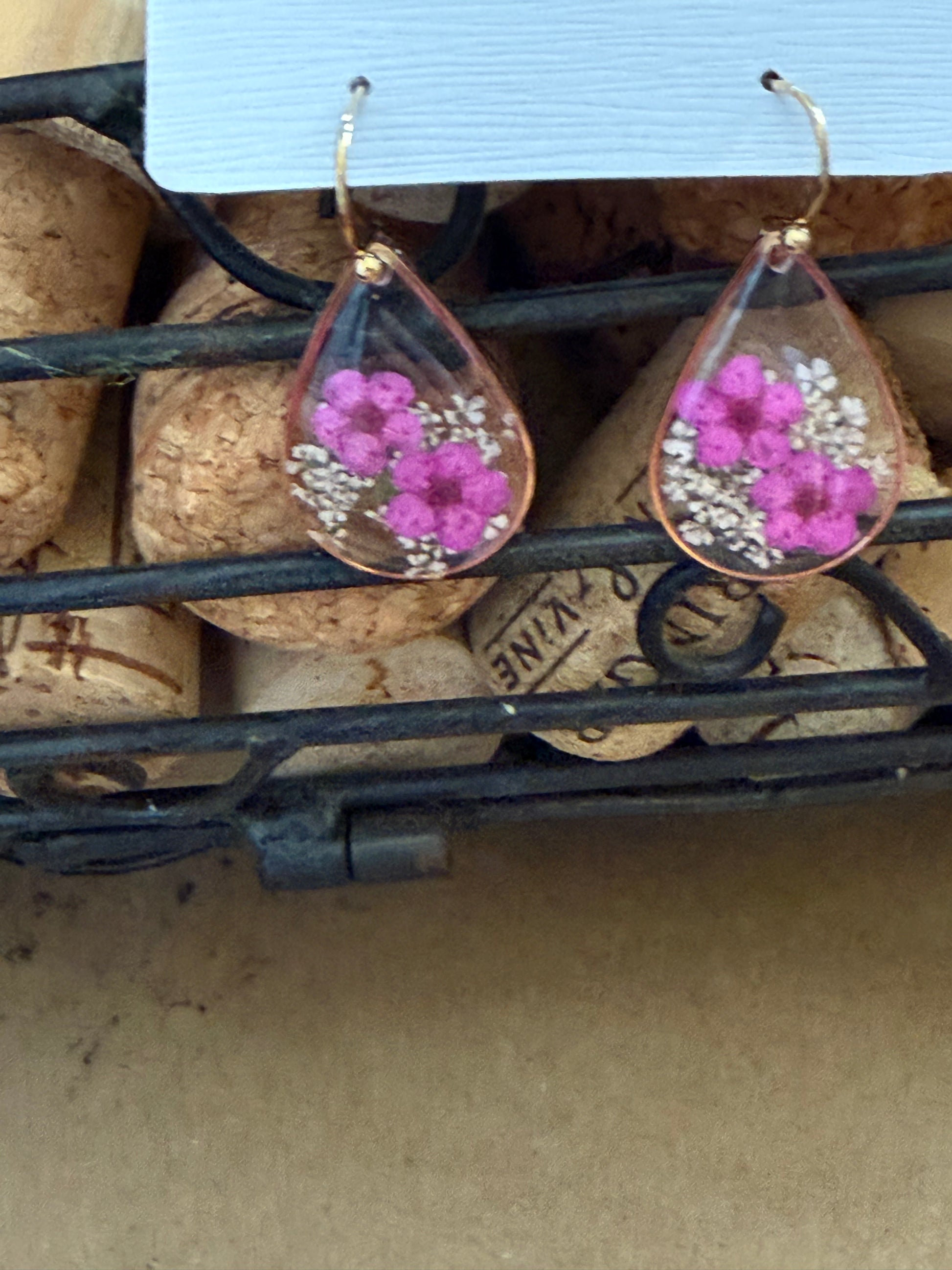 Dried flower earrings with delicate floral design and gold-tone hooks, by Ivy's Gifts & Boutique.