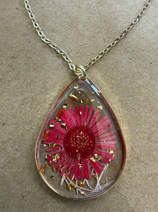Dried flower pendant necklace by Ivy's Gifts & Boutique featuring a delicate floral design on a silver chain