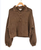 Brown washed panel pants and cropped snap sweatshirt top from Ivy's Gifts & Boutique, featuring a relaxed, casual fit.