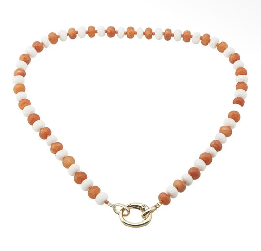 Orange and white crystal beaded necklace with charm latch from Ivy's Gifts & Boutique, featuring a decorative charm and elegant design.