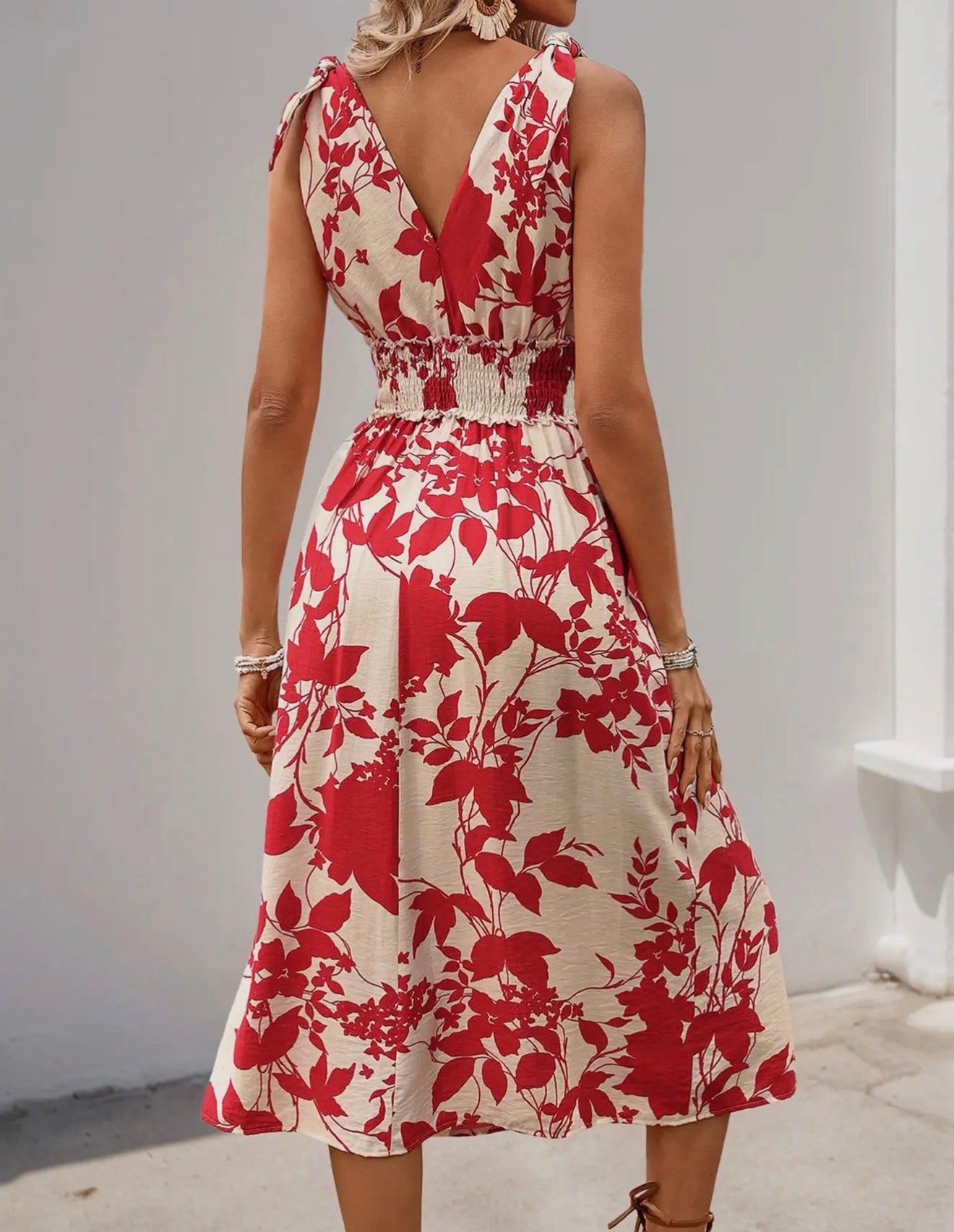 Red floral midi dress with elastic waist from Ivy's Gifts & Boutique, showcasing its lightweight fabric and elegant design.