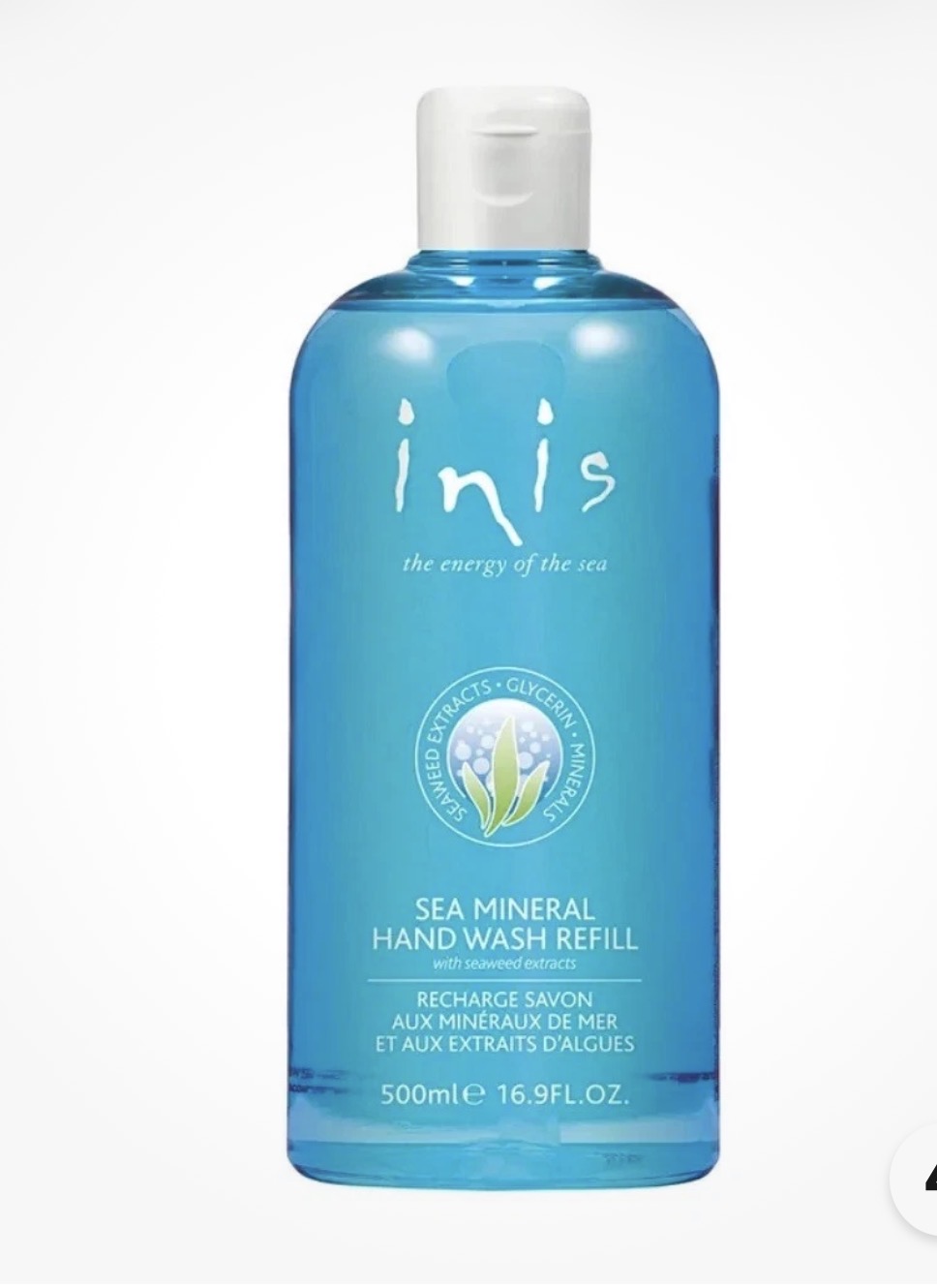 Inis bath and body products set with bottles of lotion, body wash, and skincare items on a white background.