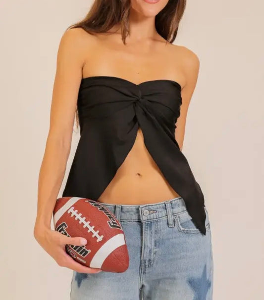 Black twist front strapless top from Ivy's Gifts & Boutique featuring handkerchief style fabric and a stylish, fitted design.