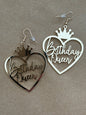 Gold Queen earrings with "Birthday" design, jewelry from Ivy's Gifts & Boutique featuring elegant, shiny gold accents.