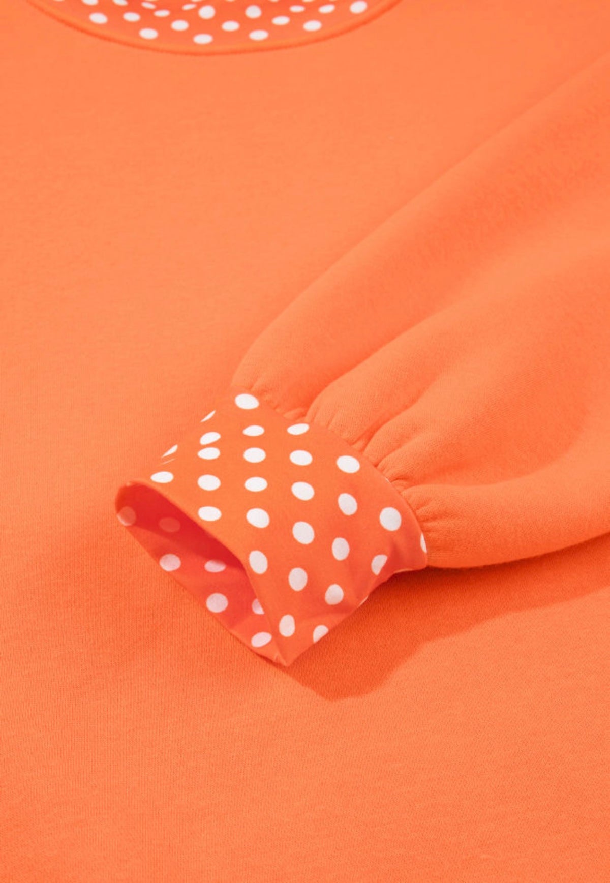 MLOPD Orange Long Sleeve Top with Polka Dot Accented Hem and Sleeve Trim