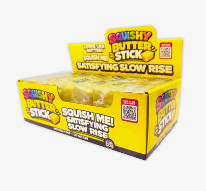 Ivy's Gifts & Boutique Toy4 Squishy Slow Rise Butter Stick in pastel yellow with smooth, soft texture and rounded shape.