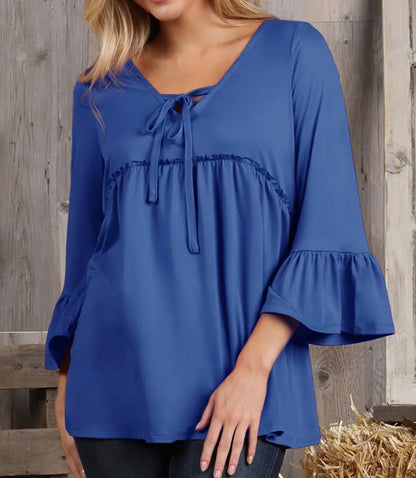 Ivy's Gifts & Boutique FR8 solid color top with 3/4 length sleeves and string tie neck detail, displayed on a hanger.