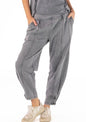 Black washed "lived-in" look pants with cute ankle buttons from Ivy's Gifts & Boutique, showcasing a relaxed, casual style.