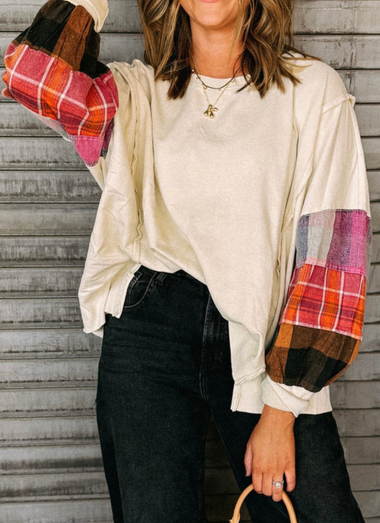 Cream top with color block/plaid sleeves