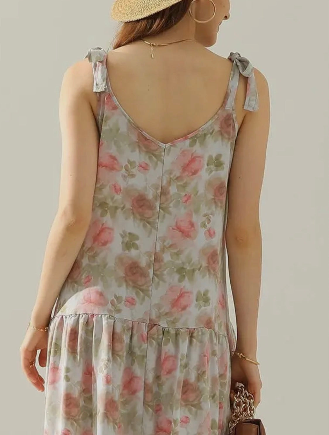 Floral maxi dress with A118 shoulder strap tie detail from Ivy's Gifts & Boutique, featuring a flowing design and vibrant floral pattern.