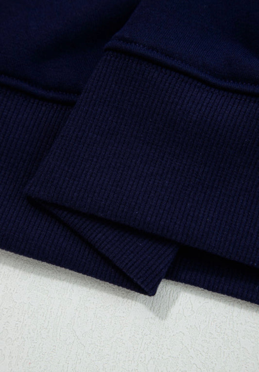 Navy oversized plush sweatshirt with "Classy Until Kickoff" lettering, cropped fit, from Ivy's Gifts & Boutique.