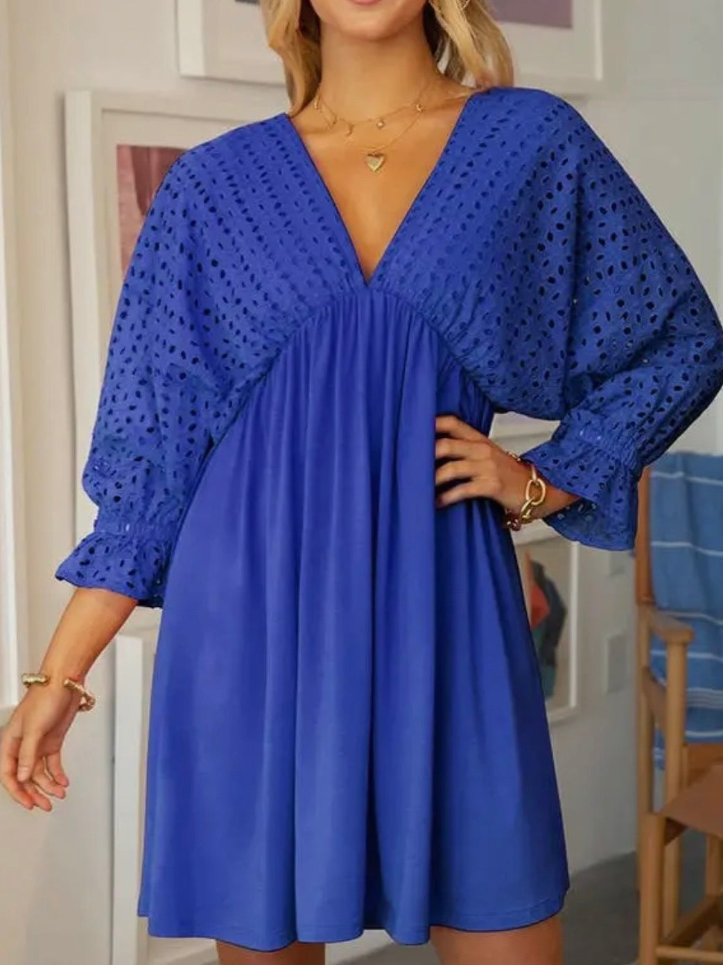 Cotton eyelet bodice dress with 3/4 length sleeves from Ivy's Gifts & Boutique, featuring a feminine and lightweight design.