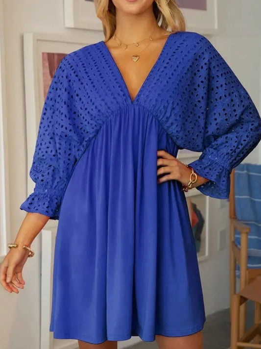 Cotton eyelet bodice dress with 3/4 length sleeves from Ivy's Gifts & Boutique, featuring a feminine and lightweight design.